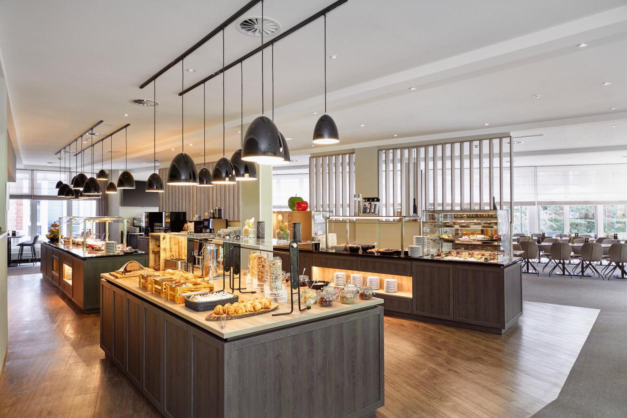 H+ Hotel Koeln เฮิร์ท ภายนอก รูปภาพ